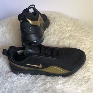 Nike Shoe Women’s Gold and Black Size 6.5 US
